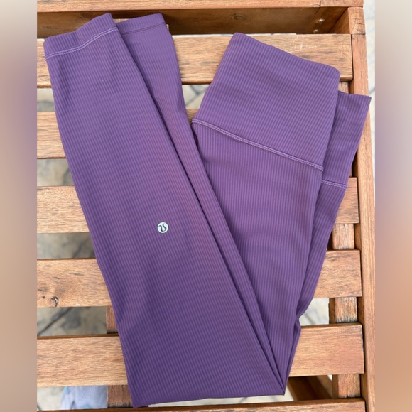 Like new Lululemon Wunder Train High-Rise Ribbed Tight 25"
Grape Thistle 8 - Picture 5 of 8